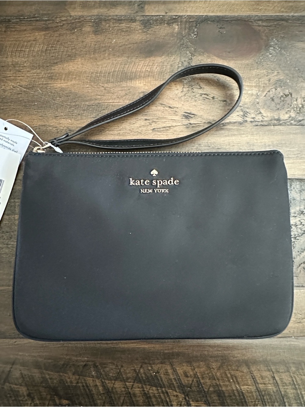 kate spade black wristlet pouch with gold logo